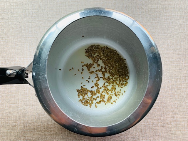 Add cumin seeds in oil