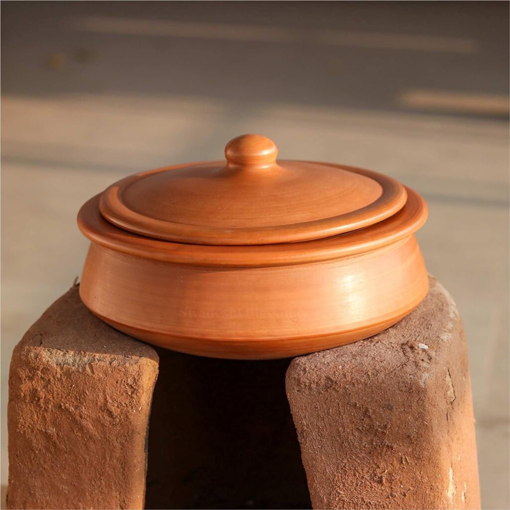 Clay pots on traditional chulha