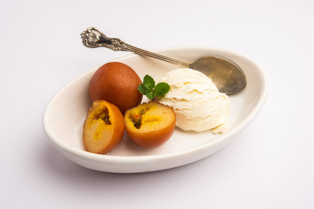 Gulab jamun served with vanilla icecream